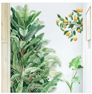 Détail de stickers muraux feuilles de bananier avec branches d'agrumes réalistes déco