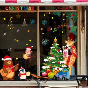 Christmas window decals featuring festive animals and trees for holiday glass decoration