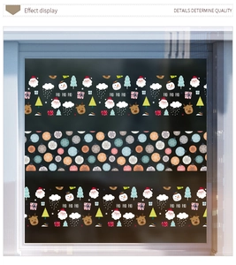 Detail of Christmas window border stickers with Santa and snowman patterns for decor