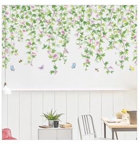 Macro detail of morning glory vine wall decal with watercolor flowers and butterflies