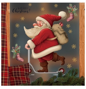 Detail of skateboarding Santa Claus window sticker with Merry Christmas text and snowflakes
