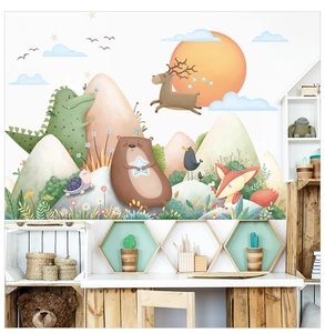 Detailed view of forest animals wall decals featuring mountains and cute cartoon dinosaurs