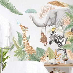 Tropical jungle wall decals featuring elephant and giraffe for a nursery bathroom setting