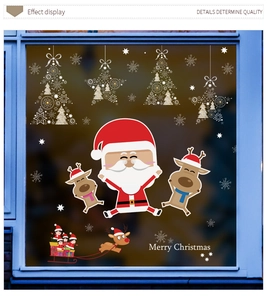 Detail view of Santa Claus and reindeer window decals for Christmas glass decoration