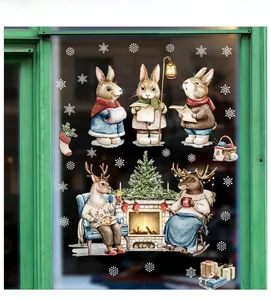 Detail of Christmas window stickers featuring watercolor rabbits, reindeer and snowflakes