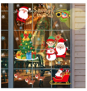 Detailed Christmas window stickers featuring Santa Claus, reindeer, and festive snowflakes