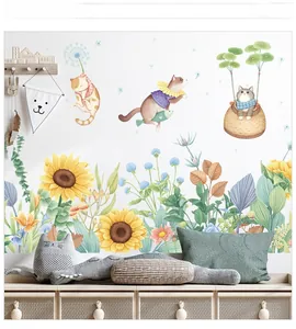 Detail view of cartoon cats and sunflowers wall stickers in a cozy children room setting