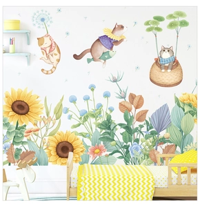 Detail of sunflower and cat wall stickers in a cozy children room with wood bed
