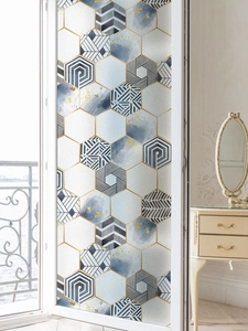 Geometric hexagon window film with blue watercolor and gold accents for privacy