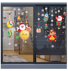 Detail of double-sided Santa Claus and reindeer window clings with snowflakes