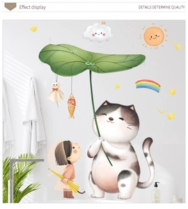 Detail display of cartoon cat and rainbow wall decals on a clean white bathroom surface