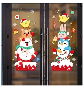 Festive Santa and snowman window stickers displayed on glass doors for Christmas decor