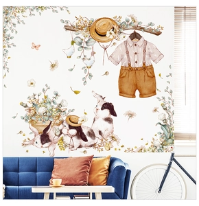 Nursery wall decals with watercolor rabbits and floral plants in a cozy living room scene