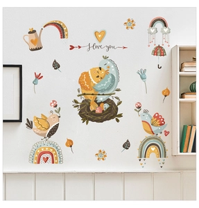 Detailed view of cartoon bird, rainbow and I love you text on kid's room wall stickers