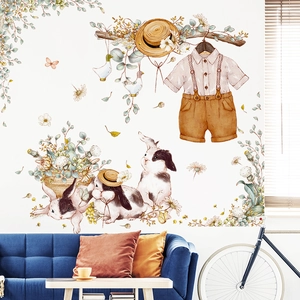 Watercolor nursery wall decals featuring cartoon bunnies, clothes, and green hanging plants