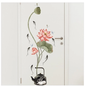 Detail view of pink lotus flower and dragonfly wall decal on a white interior door