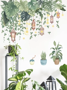 Ethnic plant wall decals with monstera leaves, hanging lanterns and potted green plants