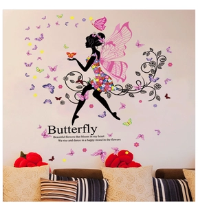 Detail of flower fairy wall decal with colorful butterflies and elegant floral patterns