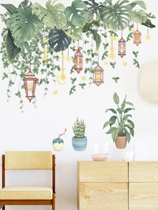 Tropical green plant wall decals with monstera leaves and vintage hanging lanterns