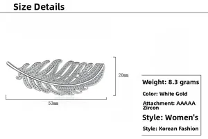 Detail view of feather brooch dimensions measuring 53mm long with zircon inlay