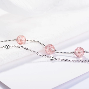 Elegant strawberry quartz silver box chain bracelet with pink beads and metallic accents