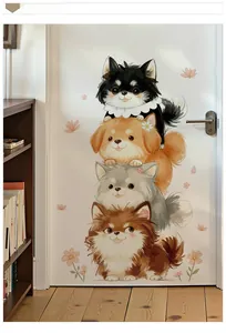 Detailed view of cute cartoon dog stickers on a white wooden door for home decor