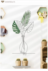 Detail showing minimalist wall sticker with Monstera leaves in vase and happy text design