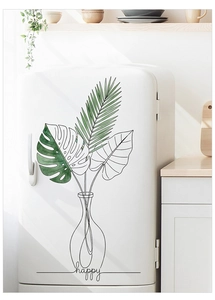 Minimalist wall sticker with tropical monstera leaves and happy text on white fridge