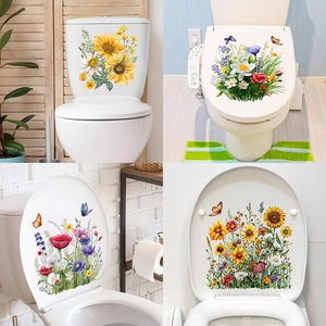 Floral toilet lid stickers with colorful sunflowers and butterflies on white surface