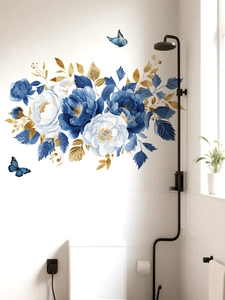 Detail of blue watercolor roses and butterflies wall decal in a modern bathroom