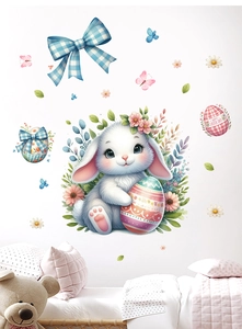 Detail of watercolor Easter bunny wall sticker with painted eggs on a nursery wall
