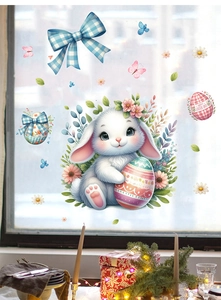 Close-up of Easter bunny and colorful egg window stickers in a cozy room setting