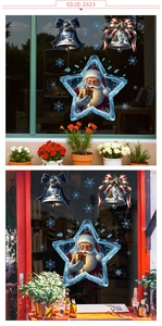 Detail of Christmas window stickers featuring Santa Claus, bells, and blue snowflakes