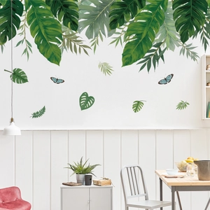Stickers muraux feuilles tropicales monstera et papillons bleus pour décoration de salon