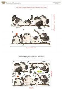 Detail of cute cartoon cat wall sticker showing layout size and final applied effect