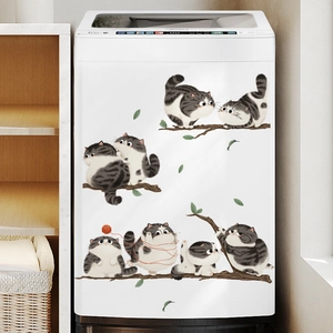 Cute cartoon cats and green leaves wall stickers decorating a white washing machine