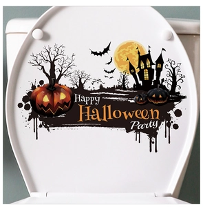 Detail of Halloween toilet sticker with pumpkin, bats, and castle on white background