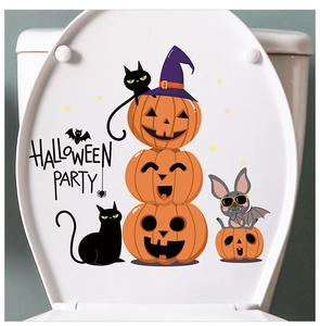 Halloween toilet lid sticker featuring cartoon pumpkins, black cat, and bats design