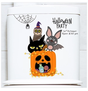 Detailed Halloween stickers featuring pumpkins, bats and owls on a white ceramic toilet tank