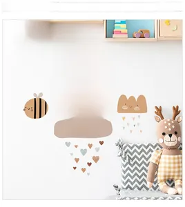 Detail of Good Vibes Only wall stickers with clouds and sun in a cozy nursery setting