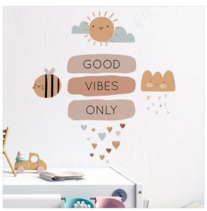 Detail of Good Vibes Only wall stickers with sun and bee motifs for kids' nursery decor