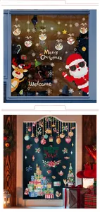 Detail of festive Christmas window stickers with Santa, reindeer and snowflake patterns