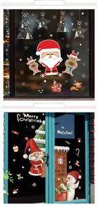 Detail of Christmas window stickers with Santa, reindeer and snowman festive designs