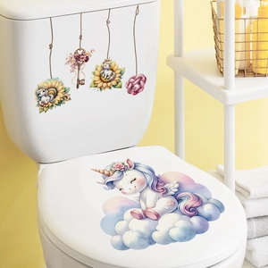 Set de stickers abattant WC licorne rose et nuages bleus pour déco de salle de bain