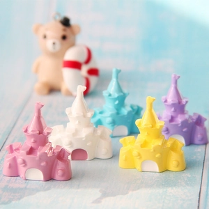 Miniature resin princess castle DIY charms in pastel pink blue and yellow colors