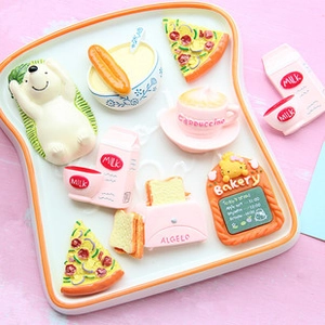 Close-up of cute resin miniature bakery breakfast set with toast tray and strawberry milk