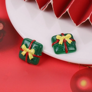 Pair of green resin Christmas gift box charms with red ribbons for DIY crafts