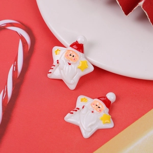 Macro shot of Santa Claus resin star flatback for DIY Christmas crafts and decor