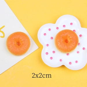 Macro detail of miniature resin donuts 2x2cm for DIY crafts and dollhouse decor