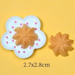 Macro detail of artificial cream cookie resin accessories with sizing info 2.7x2.8cm